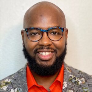 Headshot of Reverend Larry J. Morris III smiling.