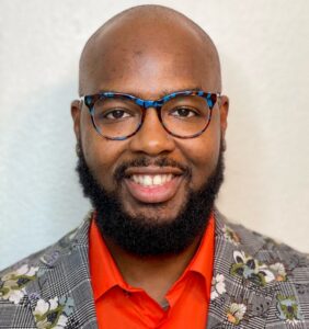 Headshot of Reverend Larry J. Morris III smiling.